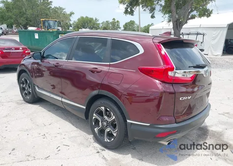 2019 Honda Cr-V Touring z USA, uszkodzony, nr VIN 7FARW2H99KE030661